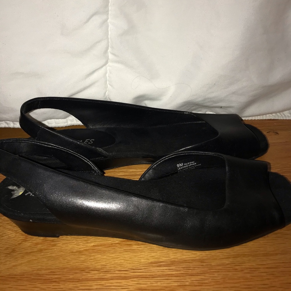 Black leather flats with slight heel
